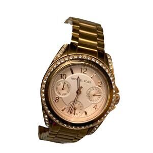 Michael Kors Blair Gold Tone Rhinestone Bezel Analog Wristwatch needs battery